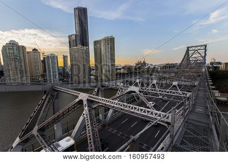 BRISBANE, AUSTRALIA - December 5 2016: Looking across Brisbane Story Bridge span on the walkway above the bridge as the sunsets over Brisbane City.