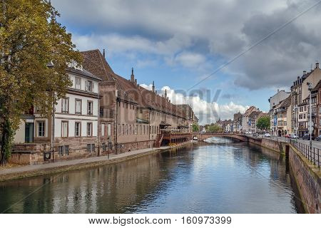View of Ill river in Strasbourg with Old Customs House France
