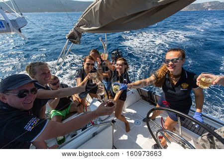 HYDRA, GREECE - SEP 28, 2016: Sailors participate in sailing regatta 16th Ellada Autumn 2016 among Greek island group in the Aegean Sea, in Cyclades and Saronic Gulf.