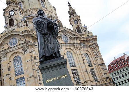 Frauenkirche (Our Lady church) and statue Martin Luther in the center of old town in Dresden Germany