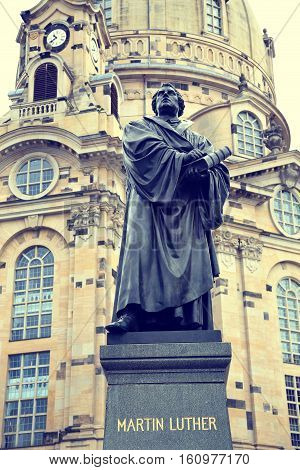 Frauenkirche (Our Lady church) and statue Martin Luther in the center of old town in Dresden Germany