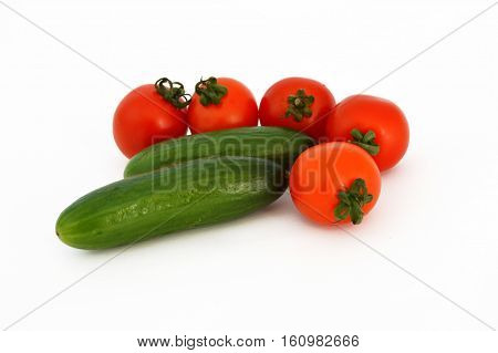 On white & copy space fresh healthy cherry tomatoes and cucumber stock pictures