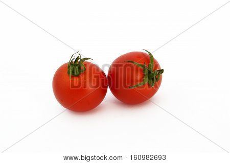 On white & copy space fresh healthy cherry tomatoes stock pictures
