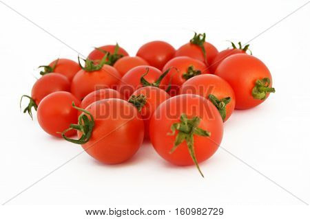 On white & copy space fresh healthy cherry tomatoes stock pictures