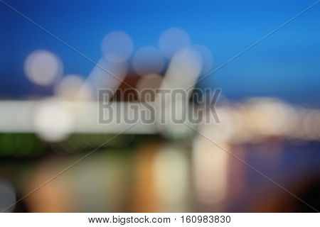 Colorful bokeh background. DEfocused Bridge in St. Petersburg. night time