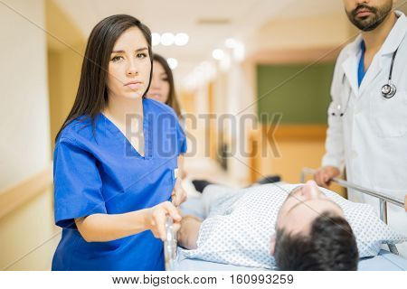 Nurse Helping Transport A Patient