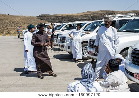 Oman Salalah - Local arab people talking during Jeep Tour at dofar Mountains Sultanate 17.10.2016.