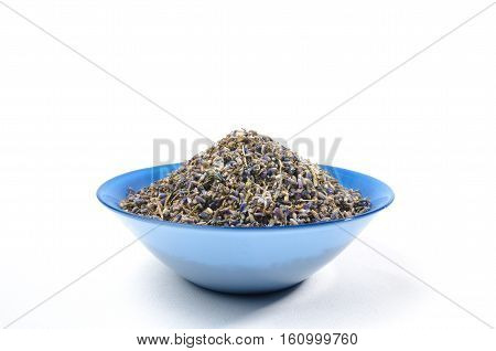 Dried lavender organic tea in wooden spoon Isolated on white background. On center side