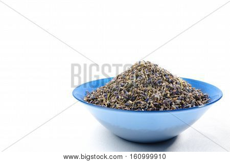 Dried lavender organic tea in wooden spoon Isolated on white background. On right side