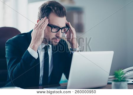 Half-turned Close Up Portrait Of Serious Focused Smart Unhappy Concentrated Bewildered Confused Unco