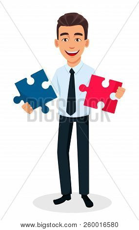 Business Man Cartoon Character Holding Two Pieces Of Puzzle. Young Handsome Smiling Businessman In O