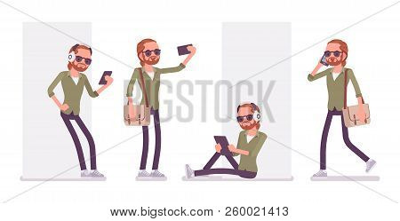Young Red-haired Man And Gadgets. Caucasian Boy With Ginger Ponytail Hairstyle And Beard, Wearing Ur