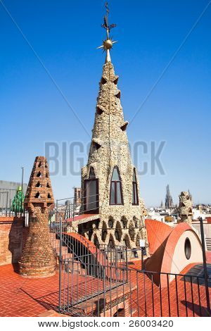 BARCELONA, SPAIN - OCTOBER 2: The mosaic chimneys on roof of Palau GÃ¼ell , one of the earlest Gaudi's  masterpieces, restored last 25 years finished 2011, on October 02, 2011 in Barcelona, Spain