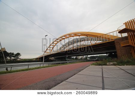 Bright Yellow Bridge Named Hogeweidebrug Over The Amsterdam-rhine Canal In Utrecht For Traffic And V