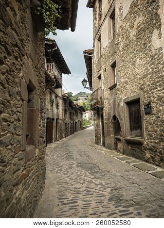 Horizontal View Of A Paved Street In The Catalan Village Of Rupit I Pruit In Summertime