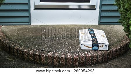 Babylon, New York, Usa - 13 September 2018: A Package Is Left On A Front Porch And Is Vulnerable To 