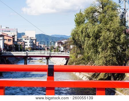 Takayama, Japan - October 6, 2015: View Of Takayama City Center From Nakabashi Bridge Across Miyagaw
