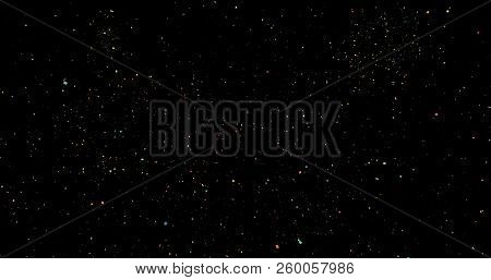 Flying Dust Particles On A Black Background