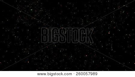 Flying Dust Particles On A Black Background