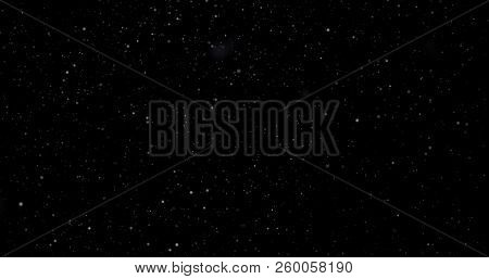 Flying Dust Particles On A Black Background