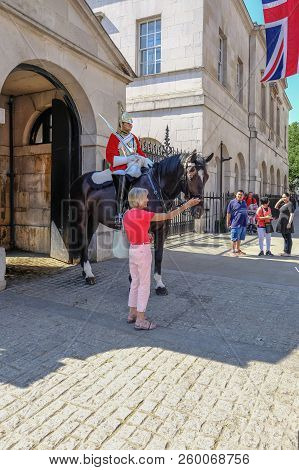 Whitehall, London, Uk - June 8, 2018: Mounted Royal Guard On Duty I Whitehall With A Lady Tourist Pa