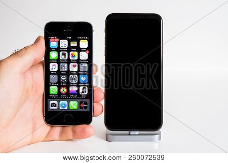 Paris, France - Sep 25, 2018: Male Hand Compare New Iphone Xs And Xs Max Smartphone Model By Apple C