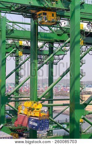 Nhava Sheva, India - March 09: Cargo Crane Of The Container Terminal In Port Of Nhava Sheva On March