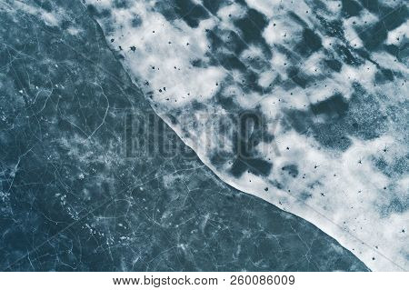 Ice Texture, Crackes, Ice Holes And Snow Drifts