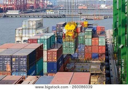 Nhava Sheva, India - March 09: Discharge Of The Ship On The Berth In Port Of Nhava Sheva On March 09