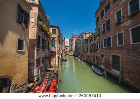 Venetial Canal And Antic Buildings. View On Rio S.polo From Calle Dei Saoneri