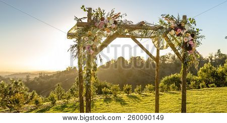 Floral Huppah With View Of Mountain And Sky