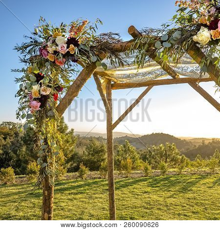 Lace Canopy With Wooden Support And Flowers