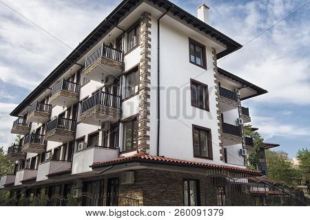 Modern Building Exterior. Facade Of A Modern Apartment Building. Vacation Complex Hotel Building, Wi
