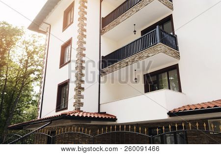 Modern Building Exterior. Facade Of A Modern Apartment Building. Vacation Complex Hotel Building, Wi