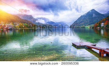Idyllic Autumn Scene In Grundlsee Lake. Misty Morning.location: Resort Grundlsee, Liezen District Of