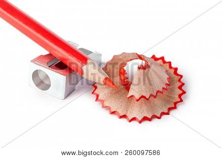 Pencil and pencil sharperner on white paper background