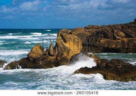 Small Waves Breaking On A Rock Formation In Thunder Point, Warrnambool, Victoria, Australia