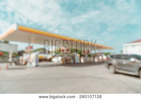 Blur Gas Station With Bkue Sky Background.
