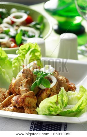Chicken stripes with salad
