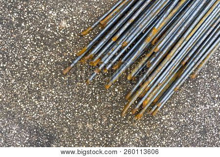 Background Of Old Metal, Mild Steel Round Bar. Reinforcement Steel Mesh Background. Background Textu