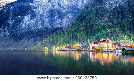 Scenic View Of Famous Hallstatt Mountain Village With Hallstatter Lake. Sunnny Autumn Evening On Hal