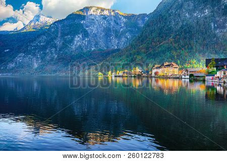 Scenic View Of Famous Hallstatt Mountain Village With Hallstatter Lake. Sunnny Autumn Evening On Hal
