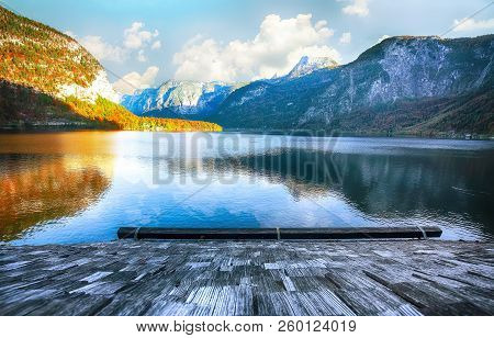 Scenic View Of Famous Hallstatt Mountain Village With Hallstatter Lake. Sunnny Autumn Evening On Hal