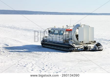 Hovercraft On Ice Of Frozen Lake In Winter. Onega Lake, Russia