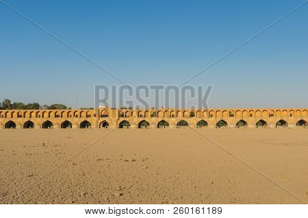 Isfahan, Iran - June, 2018: Khaju Bridge Over The Dried Up Zayandehrud River In Isfahan, Iran.