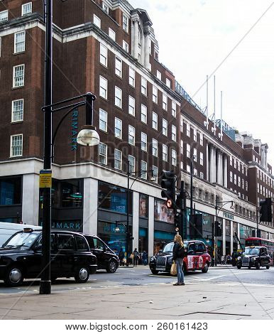 London, Uk - June 9, 2015: Tourists And Customers Near Primark Clothing Store On Oxford Street In Lo