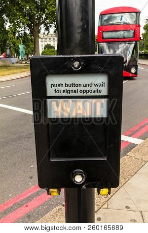 Crosswalk Button For Pedestrian With Light Warning. London. Uk