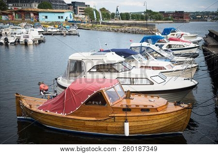 Hamar, Hedmark, Norway - 26 July 2018: River With Moored Boats