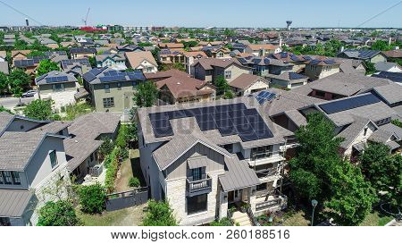 Aerial Drone View Of Solar Panels Covered All The Rooftops In A Renewable And Sustainable Neighborho