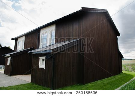 Hamar, Hedmark, Norway - 26 July 2018: Beautiful Wooden Building Under Cloudy Sky